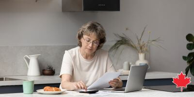 woman with computer and calculator